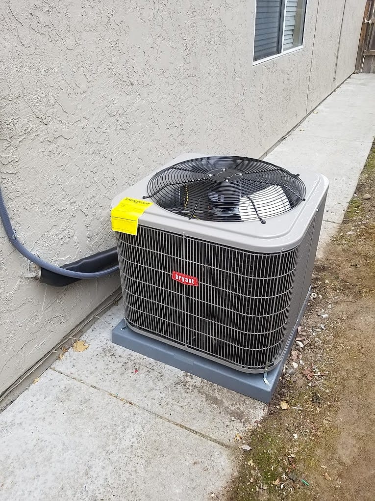 Bryant condenser installed by Progressive Heating & Air — coastal-coated equipment is what we specify for salt air in Bay Park and Bay Ho